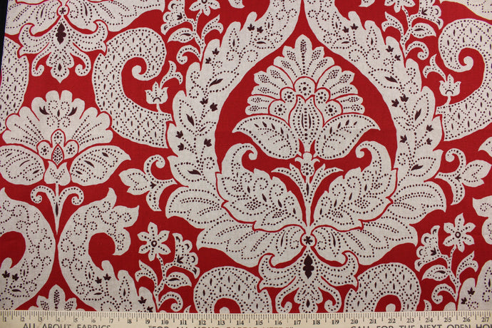 The Robert Allen© Betsy in Red features a multipurpose linen blend, with a floral damask print in natural and brown on a red background.  Perfect for adding a touch of elegance to your home décor.  It can be used for several different statement projects including window accents (drapery, curtains and swags), toss pillows, headboards, bed skirts, duvet covers, upholstery, and more.