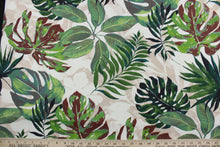 Load image into Gallery viewer, The Richloom Solarium© Piermont in Floral print contains bold, tropical palm leaves in shades of green, beige, black, and brown making it ideal for outdoor multipurpose use.  It has been tested to resist 500 hours of exposure to sunlight.  The fabric is also water and stain resistant.  Perfect for porches, patios and pool side.  Uses include toss pillows, cushions, upholstery, tote bags and more. 
