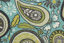 Load image into Gallery viewer, Robert Allen© Art Paisley in Rain is a stunning multipurpose fabric with a striking floral paisley petal print. Its vibrant, yet neutral palette of brown, white, citrine, green, and turquoise make it perfect for a variety of projects.  Plus, this fabric is soil and stain resistant.  It can be used for several different statement projects including window accents (drapery, curtains and swags), toss pillows, headboards, bed skirts, duvet covers and upholstery. 
