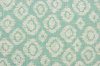 Robert Allen© Mimosa is a stunning linen blend fabric that features an ikat diamond design.  The versatile fabric is presented in aqua and ivory, allowing you to bring your decorating dreams to life.  It can be used for several different statement projects including window accents (drapery, curtains and swags), toss pillows, headboards, bed skirts, duvet covers and upholstery. 