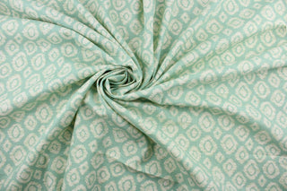 Robert Allen© Mimosa is a stunning linen blend fabric that features an ikat diamond design.  The versatile fabric is presented in aqua and ivory, allowing you to bring your decorating dreams to life.  It can be used for several different statement projects including window accents (drapery, curtains and swags), toss pillows, headboards, bed skirts, duvet covers and upholstery. 