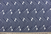 Load image into Gallery viewer, Try the Robert Allen© Knot Stripe in Navy, an outdoor-friendly multipurpose fabric with a geometrical striped print in navy blue and white.  Its 100,000 double rubs, water and stain repellant, mildew resistant, and superior light fastness make it a reliable and durable choice for all your outdoor needs. Use for pillows, cushions, upholstery, umbrellas, tote bags, and more.
