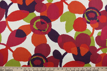 Load image into Gallery viewer,  a bright and vibrant abstract floral print in shades of red, green, orange, berry, and purple against a white background.  Its stain, moisture, and odor resistant properties make this a durable and reliable fabric for any project.  It can be used for several different statement projects including window accents (drapery, curtains and swags), toss pillows, headboards, bed skirts, duvet covers, home décor, and upholstery. 

