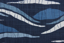 Load image into Gallery viewer, an array of hills in shades of blue and white to bring an understated beauty to any space.  Crafted with 65,000 double rubs, this fabric is exceptionally durable.  Additionally, a soil and stain repellant finish ensures that this fabric is easy to maintain.  It can be used for several different statement projects including window accents (drapery, curtains and swags), toss pillows, headboards, bed skirts, duvet covers, upholstery, and more.
