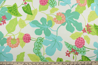 Robert Allen© Sunscape in Spring is a multipurpose fabric printed with a vibrant floral vine pattern, featuring a turquoise, pink, lime green, and grass green on a white background. The fabric is durable with 50,000 double rubs and is resistant to soil and stains. It can be used for several different statement projects including window accents (drapery, curtains and swags), toss pillows, headboards, bed skirts, duvet covers and upholstery. 