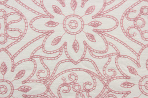  Expertly crafted, the Embroidered Grandfleur in Vanilla Cameo is an intricate floral embroidery in rose pink against an off white background, making a statement of elegance and sophistication.  Uses include drapery, pillows, light upholstery, table runners, bedding, headboards, home décor and apparel.  