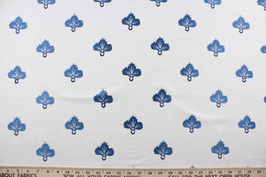 Effortlessly elevate any space with the versatile and elegant Embroidered August in Twilight.  The finely embroidered medium blue medallion with pearl grey accents, set against a white background adds a touch of sophistication to drapery, pillows, light upholstery, table runners, bedding, headboards, home décor, and even apparel. Perfect for any style or purpose.