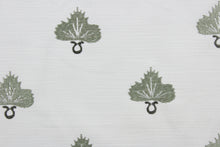 Load image into Gallery viewer, Effortlessly elevate any space with the versatile and elegant Embroidered August in Pearl Greyhound. The finely embroidered sage green medallion with pearl grey accents, against a white background adds a touch of sophistication to drapery, pillows, light upholstery, table runners, bedding, headboards, home décor, and even apparel. Perfect for any style or purpose.
