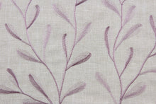 Load image into Gallery viewer, The Embroidered Tangle in Beige Crocus features a stunning vine leaf design in lavender set against a beige background.  The elegant design adds an elegant touch to any space. Its multi-purpose use makes it a versatile choice for drapery, pillows, light upholstery, table runners, bedding, headboards, home décor, and even apparel. 
