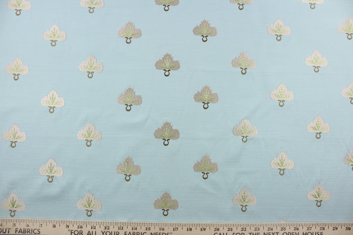 Effortlessly elevate any space with the versatile and elegant Embroidered August in Celadon Mushroom. The finely embroidered mushroom colored medallion with brown and green accents, against a celadon background adds a touch of sophistication to drapery, pillows, light upholstery, table runners, bedding, headboards, home décor, and even apparel. Perfect for any style or purpose.