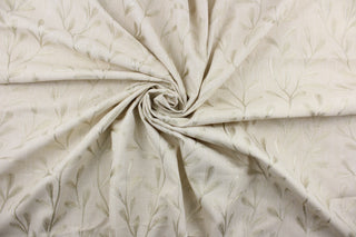 The Embroidered Tangle in Straw features a stunning vine leaf design that adds an elegant touch to any space. Its multi-purpose use makes it a versatile choice for drapery, pillows, light upholstery, table runners, bedding, headboards, home décor, and even apparel. 