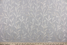 Load image into Gallery viewer, The Embroidered Tangle in Grey Pewter features a stunning vine leaf design in champagne set against a grey pewter background.  The elegant design adds an elegant touch to any space. Its multi-purpose use makes it a versatile choice for drapery, pillows, light upholstery, table runners, bedding, headboards, home décor, and even apparel. 
