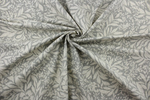  The Robert Allen© Indiki Blooms in Greystone fabric is perfect for multipurpose use, featuring a unique floral print that blends the grey and natural colorways.  Made from highly durable cotton, this fabric offers up to 100,000 double rubs.  It can be used for several different statement projects including window accents (drapery, curtains and swags), toss pillows, headboards, bed skirts, duvet covers, upholstery, and more.