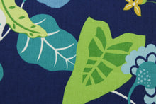 Load image into Gallery viewer, Robert Allen© Sunscape in Caribe is a multipurpose fabric printed with a vibrant floral vine pattern, featuring green, yellow, caribe, white, sky blue, and turquoise on a navy blue background. The fabric is durable with 50,000 double rubs and is resistant to soil and stains. It can be used for several different statement projects including window accents (drapery, curtains and swags), toss pillows, headboards, bed skirts, duvet covers and upholstery. 
