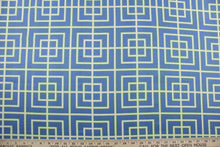 Load image into Gallery viewer, This Robert Allen© Square Lattice in Hydrangea fabric features a sophisticated multipurpose geometrical lattice print in a stunning combination of blue, lime green, and white colors.  This fabric is strong and durable with 30,000 double rubs and soil and stain resistant for long lasting use.  It can be used for several different statement projects including window accents (drapery, curtains and swags), toss pillows, headboards, bedding, upholstery, and more.
