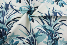 Load image into Gallery viewer, Discover a beautiful multi-purpose fabric featuring a modern botanical floral print in shades of blue set against a white background. Crafted from Robert Allen©, it has an impressive 30,000 double rubs for lasting durability and luxurious comfort. It can be used for several different statement projects including window accents (drapery, curtains and swags), toss pillows, headboards, bed skirts, duvet covers, upholstery, and more.
