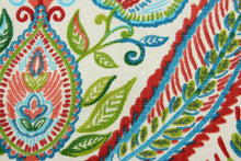 Load image into Gallery viewer, Robert Allen© Ombre Paisley in Poppy is a versatile multipurpose fabric made from a cotton basket weave.  The bright and colorful paisley design features an ombre effect in shades of red, coral, green, turquoise and blue against a light cream background.  It can be used for several different statement projects including window accents (drapery, curtains and swags), toss pillows, headboards, bed skirts, duvet covers, upholstery, and more.
