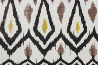 Suburban Fabrics© Clyde in Black/Gold is a multipurpose low pile printed chenille featuring an ethnic geometric design in black, brown, and gold against a pearl background.  Its soil and stain repellant with 50,000 double rubs makes it perfect for active households.  It is great for upholstery projects including sofas, chairs, dining chairs, pillows, handbags and craft projects. 