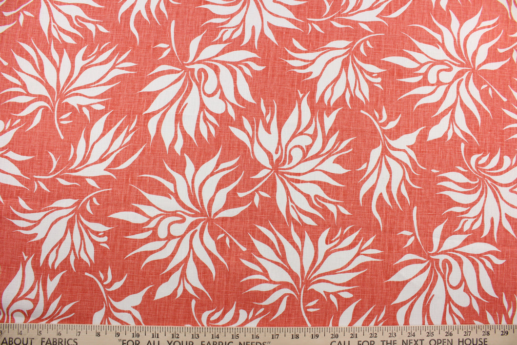 The Duralee© Bella in Coral is a versatile fabric that will give an elegant touch to any room.  The fabric features white leaves against a coral background, and it is made of high-performance fibers that make it highly durable: it has up to 50,000 double rubs and is soil and stain repellant.  It can be used for several different statement projects including window accents (drapery, curtains and swags), toss pillows, headboards, bed skirts, duvet covers, upholstery, and more.