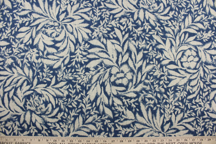 The Robert Allen© Indiki Blooms in Indigo fabric is perfect for multipurpose use, featuring a unique floral print that blends the indigo and natural colorways.  Made from highly durable cotton, this fabric offers up to 100,000 double rubs.  It can be used for several different statement projects including window accents (drapery, curtains and swags), toss pillows, headboards, bed skirts, duvet covers, upholstery, and more.