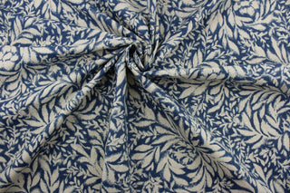 The Robert Allen© Indiki Blooms in Indigo fabric is perfect for multipurpose use, featuring a unique floral print that blends the indigo and natural colorways.  Made from highly durable cotton, this fabric offers up to 100,000 double rubs.  It can be used for several different statement projects including window accents (drapery, curtains and swags), toss pillows, headboards, bed skirts, duvet covers, upholstery, and more.