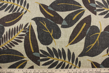Load image into Gallery viewer, Robert Allen© Fresh Leaf in Terrain, features a stunning leaf print with shades of brown, gold, and hints of sage against a tan background. Durable and resistant to both spoil and stains, it is rated for 30,000 double rubs. It can be used for several different statement projects including window accents (drapery, curtains and swags), toss pillows, headboards, bed skirts, duvet covers, upholstery, and more.
