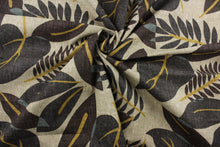 Load image into Gallery viewer, Robert Allen© Fresh Leaf in Terrain, features a stunning leaf print with shades of brown, gold, and hints of sage against a tan background. Durable and resistant to both spoil and stains, it is rated for 30,000 double rubs. It can be used for several different statement projects including window accents (drapery, curtains and swags), toss pillows, headboards, bed skirts, duvet covers, upholstery, and more.
