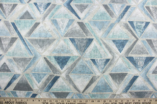 Covington© Opaline in Hazy - the perfect blend of style and versatility.  This multipurpose fabric boasts a contemporary design available in Spa Blue, Grey, Sand, and Off White.  With 20,000 double rubs, it offers exceptional durability for any project.  It can be used for several different statement projects including window accents (drapery, curtains and swags), decorative pillows, hand bags, bed skirts, duvet covers, upholstery and craft projects.  