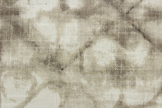 This fabric is a blend of cotton and linen with brown hues featuring a shibori style print.  It can be used for several different statement projects including window accents (drapery, curtains and swags), decorative pillows, hand bags, bed skirts, duvet covers, upholstery and craft projects.  It has a soft workable feel yet is stable and has a durability rating of 20,000 double rubs.