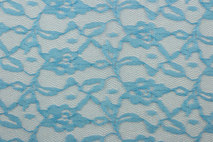  Our Woven Lace in Royal Blue is expertly crafted with a delicate floral design.  Add an elegant touch to any project with this high-quality lace.  Made with precision and attention to detail, our lace adds a sophisticated touch to your creations.  Uses include apparel, costumes, and home décor.