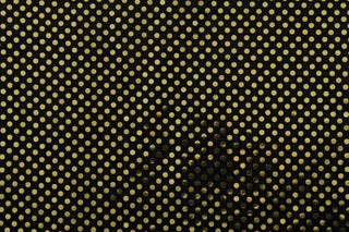 Create a stunning statement with our Sequined Shiny Spots in Black and Gold.&nbsp; The black velvet base creates a rich and luxurious backdrop, while the gold sequins add just the right amount of shimmer and shine. <span></span>&nbsp;Perfect for adding sparkle to special occasion apparel, dancewear, costumes, overlays, table tops, and decorations.&nbsp;