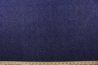 Glittered in Navy boasts a blue base adorned with iridescent glittering sparkles to add a touch of glam.&nbsp; Enjoy ultimate comfort and flexibility with its 8 way stretch material.&nbsp; Perfect for adding sparkle to special occasion apparel, dancewear, costumes, overlays, table tops, and decorations.&nbsp;