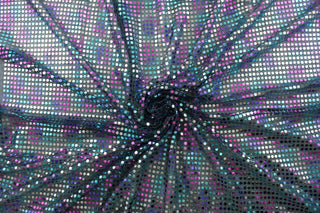 "Add a touch of shimmer with our Sequined Scales in Multi."&nbsp; The semi-sheer black nylon tulle base is decorated with iridescent sequins for a playful yet stylish look.&nbsp; Perfect for adding sparkle to special occasion apparel, dancewear, costumes, overlays, table tops, and decorations.&nbsp;