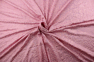 Expertly crafted with a delicate polyester blend pink base cloth, these small pink sparkling sequins will add a touch of glamour and shine to any project.&nbsp; With their eye-catching shimmer and professional quality, they are perfect for adding a chic and sophisticated touch to your designs.&nbsp; <span></span>Enjoy ultimate comfort and flexibility with its 8 way stretch.&nbsp; Perfect for adding sparkle to special occasion apparel, dancewear, costumes, overlays, table tops, and decorations.&nbsp;