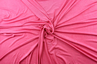 Glittered in Pink boasts a beautiful pink hue adorned with silver glittering sparkles to add a touch of glam.  Enjoy ultimate comfort and flexibility with its 8 way stretch material.  Perfect for adding sparkle to special occasion apparel, dancewear, costumes, overlays, table tops, and decorations. 