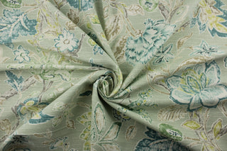 Romolo in Mist is a versatile, medium weight fabric with a beautiful Jacobean floral print. Its 2-way slub duck cloth construction adds texture and depth. Featuring shades of green, blue, taupe, and white, this fabric is both stylish and functional. With soil and stain repellent properties and 15,000 double rubs, it is perfect for any project or space.&nbsp;