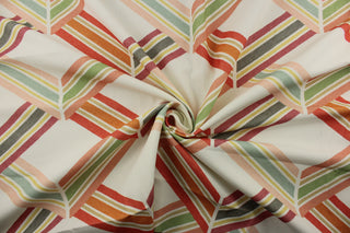 a geometric print fabric that adds a touch of color to any space. With shades of apricot, red, pink, green, berry, gray, and yellow against a white background, it is sure to brighten up any room. Plus, it is soil and stain repellant for easy maintenance.&nbsp;Great for window accents (draperies, valances, curtains and swags) cornice boards, accent pillows, bedding, headboards, cushions, ottomans, slipcovers and upholstery. <span data-mce-fragment="1">&nbsp;</span>