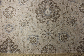 This P/Kaufmann© Sariz fabric in Pearl features a Jacobean floral print, in shades of blue, brown, white, and taupe. Its heavy and durable construction, with a sheen finish, makes it perfect for drapes, bedding, pillows, and light upholstery. With a soil and stain repellant finish and 30,000 double rubs, it is both stylish and practical.