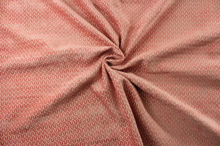 Expertly woven with a contemporary geometric design, P Kaufmann© Petite in Peony adds a touch of modern elegance to any room. The soft chenille fabric offers a luxurious feel, while the rose color brings a warm and inviting atmosphere. Great for upholstery projects including sofas, chairs, dining chairs, pillows, handbags and craft projects.&nbsp;&nbsp;