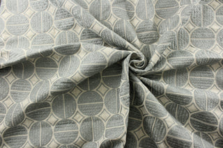 P/Kaufmann© Medallion in Pewter offers versatility with its multipurpose use. The embroidered geometric pewter medallions bring a touch of elegance to any project, while the natural background adds a touch of warmth. With a durability of 51,000 double rubs, this fabric is perfect for upholstery, bedding, and drapery, making it a must-have for any project.
