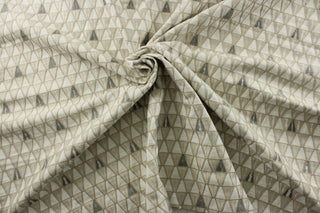 Expertly crafted with a medium weight polyester blend duck base, P/Kaufmann© Grenada in Sandstone adds raised geometrical embroidered accents in a soft neutral sandstone, gray, and white color scheme. With 51,000 double rubs, this multipurpose fabric is ideal for upholstering furniture and creating stunning drapery.