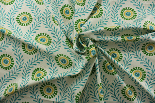 Featuring a bright suzani floral print in shades of turquoise, yellow, green, and white, this fabric is sure to add a lively pop of color to any space.&nbsp; Made with 51,000 double rubs, it is durable and long-lasting.&nbsp; The versatile fabric is perfect for window accents (draperies, valances, curtains and swags) cornice boards, accent pillows, bedding, headboards, cushions, ottomans, slipcovers and upholstery. <span data-mce-fragment="1">&nbsp;</span>