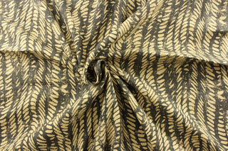 multipurpose use with its cotton blend and contemporary wavy stripe pattern in shades of charcoal and tan. With a high abrasion resistance of 15,000 double rubs, this fabric is perfect for any project that requires both style and durability.&nbsp;The versatile fabric is perfect for window accents (draperies, valances, curtains and swags) cornice boards, accent pillows, bedding, headboards, cushions, ottomans, slipcovers and upholstery. <span data-mce-fragment="1">&nbsp;</span>