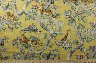 scenic jungle chinoiserie print with cheetahs, floral branches, and a variety of colors including green, gray, mauve, tan, black, and white, all set against a distressed gold background. This fabric has a soil and stain repellant finish, and a durability rating of 15,000 double rubs. Perfect for window accents (draperies, valances, curtains and swags) cornice boards, accent pillows, bedding, headboards, cushions, ottomans, slipcovers and upholstery. <span data-mce-fragment="1">&nbsp;</span>