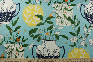 This multipurpose printed cotton fabric by P Kaufmann features large scale flowers in vases, bees, and a beautiful blend of navy blue, fern green, yellow, white, and orange on a baby blue background. With 51,000 double rubs, this basketweave fabric is durable and versatile for any project.&nbsp;Perfect for window accents (draperies, valances, curtains and swags) cornice boards, accent pillows, bedding, headboards, cushions, ottomans, slipcovers and upholstery. <span data-mce-fragment="1">&nbsp;</span>