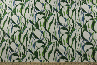  Transform your space with P Kaufmann© Metamorphic Geode in Verde. Featuring a crisp white background and vibrant botanical print in shades of green and blue, this fabric is both durable and visually stunning with a double rubs rating of 48,000.&nbsp;Perfect for window accents (draperies, valances, curtains and swags) cornice boards, accent pillows, bedding, headboards, cushions, ottomans, slipcovers and upholstery. <span data-mce-fragment="1">&nbsp;</span>