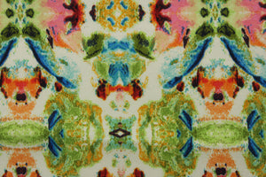 This outdoor print features a stunning kaleidoscopic array of abstract watercolor shapes in blue, green, pink, orange, yellow, black, and white.&nbsp; With a water repellant finish and 33,000 double rubs, this fabric is both visually appealing and durable for outdoor use. &nbsp;Great for<span data-mce-fragment="1">&nbsp;cushions, tablecloths, upholstery projects, decorative pillows and craft projects.&nbsp; Recommended to store away when not in use.</span>
