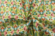 Load image into Gallery viewer, This outdoor print features a stunning kaleidoscopic array of abstract watercolor shapes in blue, green, pink, orange, yellow, black, and white.&nbsp; With a water repellant finish and 33,000 double rubs, this fabric is both visually appealing and durable for outdoor use. &nbsp;Great for&lt;span data-mce-fragment=&quot;1&quot;&gt;&nbsp;cushions, tablecloths, upholstery projects, decorative pillows and craft projects.&nbsp; Recommended to store away when not in use.&lt;/span&gt;
