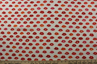 Introducing PK Lifestyles© Novogratz Outdoor Lips In Glam, featuring bold red lips against a crisp white background.&nbsp; Elevate your outdoor space with this playful and eye-catching design.&nbsp; With a remarkable 33,000 double rubs, it's built to last.&nbsp; Great for<span data-mce-fragment="1">&nbsp;cushions, tablecloths, upholstery projects, decorative pillows and craft projects.&nbsp; Recommended to store away when not in use.</span>