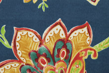 Load image into Gallery viewer, This durable fabric features a vibrant watercolor jacobean print with floral motifs in shades of red, green, gold and white against a striking navy blue background. It&#39;s also stain and water repellant and offers 500 UV hours for long-lasting use.&nbsp; Perfect for lounge cushions, pool furniture, tablecloths, decorative pillows and upholstery projects. &lt;span data-mce-fragment=&quot;1&quot;&gt;Recommended to store away when not in use.&lt;/span&gt;
